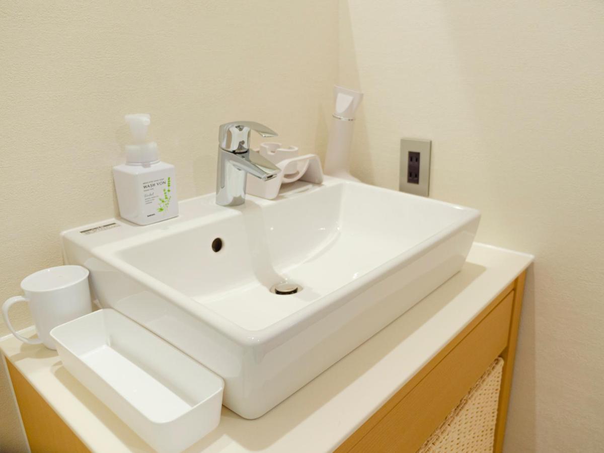 Апартаменты Grand Base Sumiyoshi Фукуока Экстерьер фото